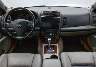 Подержанный автомобиль Cadillac CTS Sedan 2006 года (14 фото)