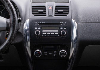 Подержанный автомобиль Suzuki SX4 Hatchback 2010 года (14 фото)