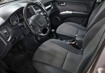 Подержанный автомобиль Kia Sportage 2010 года (17 фото)