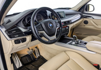 Подержанный автомобиль BMW X5 2014 года (16 фото)