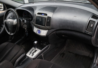 Подержанный автомобиль Hyundai Elantra Sedan 2010 года (7 фото)