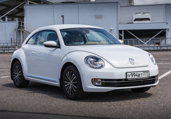 Подержанный автомобиль Volkswagen Beetle Hatchback 2014 года (3 фото)