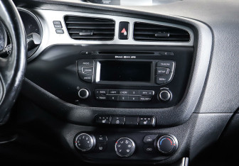 Подержанный автомобиль Kia Ceed Wagon 2014 года (15 фото)