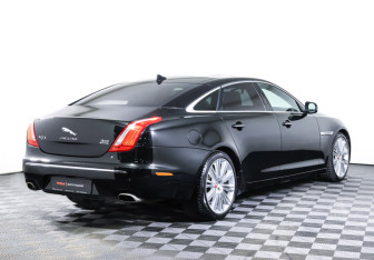 Подержанный автомобиль Jaguar XJ 2013 года (6 фото)