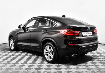 Подержанный автомобиль BMW X4 2015 года (7 фото)