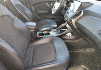 Подержанный автомобиль Hyundai ix35 2011 года (9 фото)