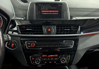 Подержанный автомобиль BMW X1 2017 года (14 фото)