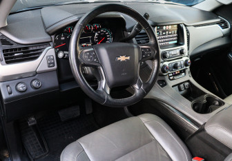 Подержанный автомобиль Chevrolet Tahoe 2016 года (14 фото)