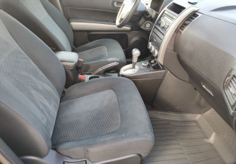 Подержанный автомобиль Nissan X-Trail 2012 года (9 фото)