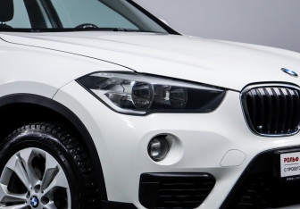 Подержанный автомобиль BMW X1 2016 года (17 фото)