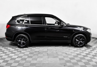 Подержанный автомобиль BMW X5 2014 года (4 фото)