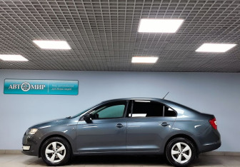 Подержанный автомобиль Skoda Rapid Liftback 2015 года (8 фото)