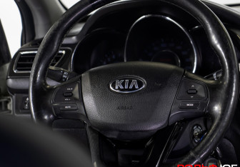 Подержанный автомобиль Kia Rio Sedan 2013 года (13 фото)
