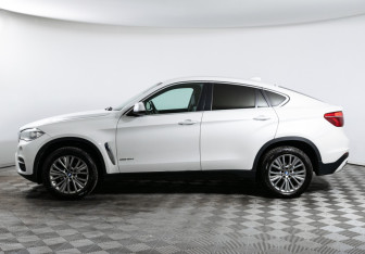 Подержанный автомобиль BMW X6 2015 года (8 фото)