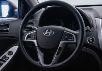 Подержанный автомобиль Hyundai Solaris Hatchback 2012 года (15 фото)