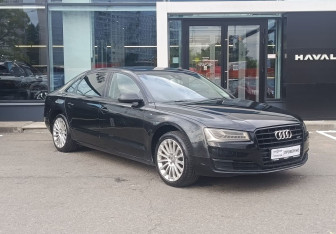 Подержанный автомобиль Audi A8 2014 года (3 фото)