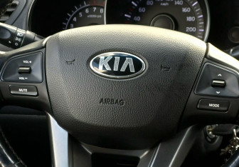 Подержанный автомобиль Kia Rio Sedan 2014 года (12 фото)