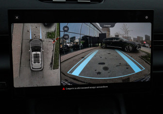 Подержанный автомобиль Omoda C7 2025 года (13 фото)