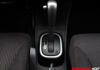 Подержанный автомобиль Nissan Tiida Sedan 2011 года (13 фото)