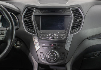 Подержанный автомобиль Hyundai Santa Fe 2014 года (14 фото)
