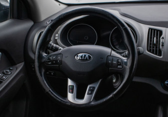 Подержанный автомобиль Kia Sportage 2014 года (15 фото)