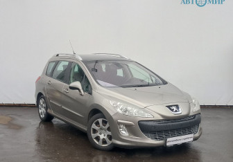 Подержанный автомобиль Peugeot 308 Wagon 2010 года (3 фото)