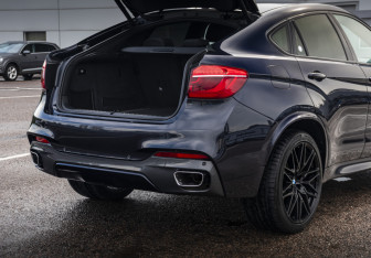 Подержанный автомобиль BMW X6 2018 года (20 фото)