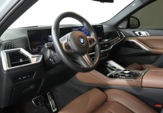 Подержанный автомобиль BMW X6 2024 года (13 фото)