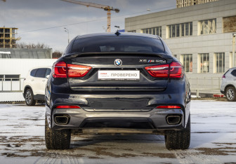 Подержанный автомобиль BMW X6 2015 года (6 фото)