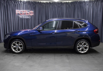 Подержанный автомобиль BMW X1 2013 года (8 фото)