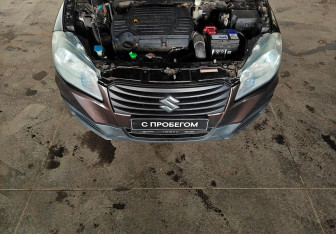 Подержанный автомобиль Suzuki SX4 Hatchback 2014 года (15 фото)