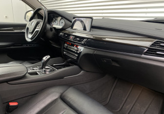 Подержанный автомобиль BMW X6 2016 года (9 фото)