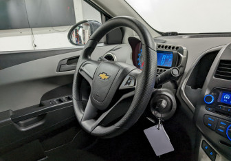 Подержанный автомобиль Chevrolet Aveo Sedan 2015 года (21 фото)