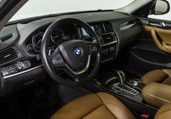 Подержанный автомобиль BMW X4 2016 года (10 фото)