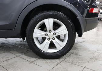 Подержанный автомобиль Kia Sportage 2012 года (9 фото)