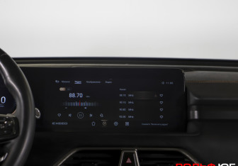 Подержанный автомобиль Exeed TXL 2023 года (14 фото)