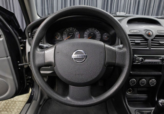 Подержанный автомобиль Nissan Almera Classic 2011 года (17 фото)