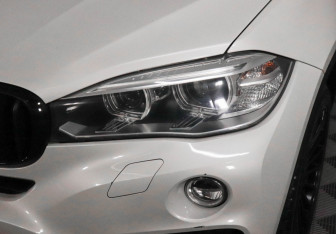 Подержанный автомобиль BMW X6 2015 года (7 фото)