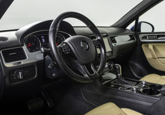Подержанный автомобиль Volkswagen Touareg 2014 года (9 фото)