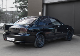 Подержанный автомобиль Nissan Almera Classic 2008 года (5 фото)