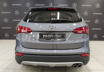 Подержанный автомобиль Hyundai Santa Fe 2014 года (6 фото)