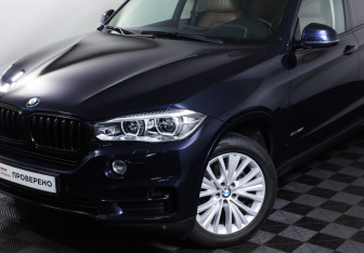 Подержанный автомобиль BMW X5 2016 года (23 фото)