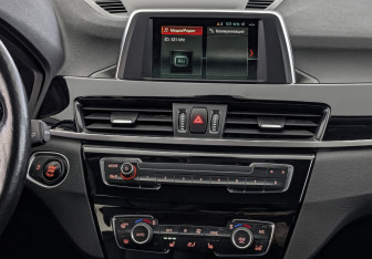 Подержанный автомобиль BMW X1 2018 года (17 фото)