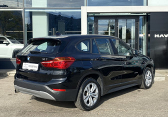 Подержанный автомобиль BMW X1 2016 года (5 фото)