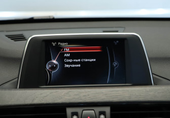 Подержанный автомобиль BMW X1 2016 года (19 фото)