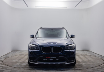 Подержанный автомобиль BMW X1 2014 года (2 фото)