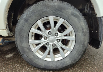 Подержанный автомобиль Mitsubishi Pajero Sport 2014 года (13 фото)