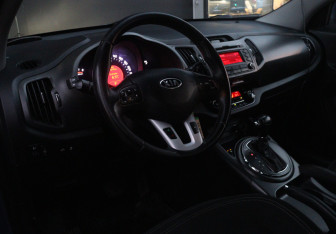 Подержанный автомобиль Kia Sportage 2011 года (15 фото)