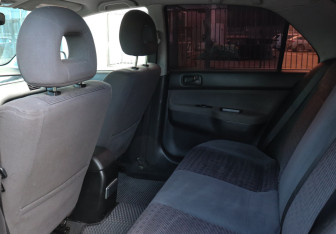 Подержанный автомобиль Mitsubishi Lancer Sedan 2005 года (10 фото)
