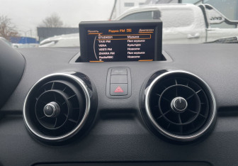 Подержанный автомобиль Audi A1 2012 года (13 фото)